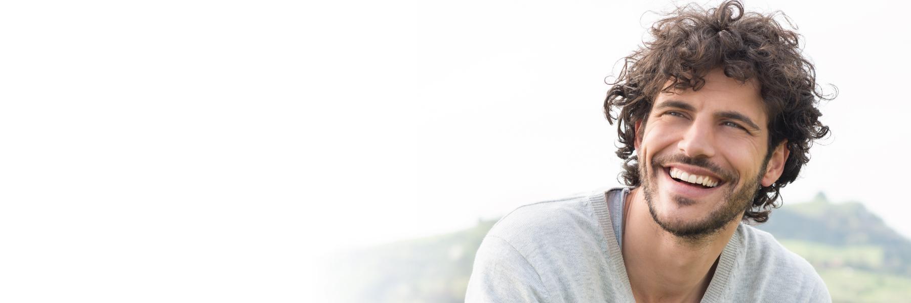 young man at a cosmetic dentist in perth