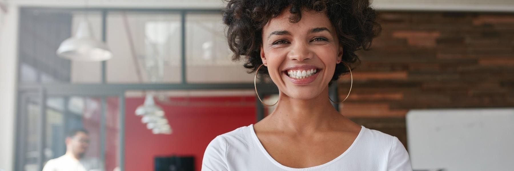 woman smiling with her dental implants in perth au